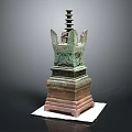 Ancient Bronze Pagoda With Multi Tiered Structure Square Base And Intricate Carvings On White Pedestal