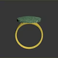 Elegant Green Round Stone Ring With Gold Band And Textured Surface