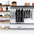 Modern Hangers With Hanging Coats Shirts Folded Clothes And Storage Boxes On Wall Shelves