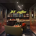 Warm Café Interior With Brick Wall Bookshelves Framed Paintings And Cozy Seating