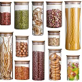 Transparent Food Storage Containers with Various Foods Like Beans Pasta Nuts and Cookies
