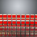 Red Jars With White Labels Neatly Arranged On Gray Background With Reflections
