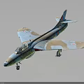 Military Airplane Model with Blue Green Brown Camouflage Cockpit Landing Gear Down and Dark Background