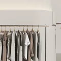 Modern Clothes Rack In Clothing Store Interior With Hanging Clothes Mirror And Shoes
