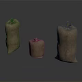 Burlap Storage Sacks In Various Sizes With Tied Tops For Household Use