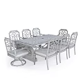 Vintage Dining Table And Chairs Set With Carved Backrests And Upholstered Seats