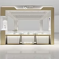Elegant Jewelry Store Interior With White And Gold Display Cases And Jewelry Exhibits