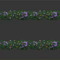 Colorful Flowering Plants Arranged in Lush Green Borders with Mixed Blooms