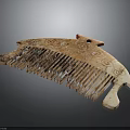 Vintage Wooden Comb With Intricate Carved Patterns And Elegant Curved Design