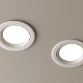 Sleek White Recessed Downlights On Beige Ceiling For Modern Lighting Design 3d model