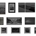 Gallery Wall Display of Black and White Photos with Landscapes Architecture and Bicycle