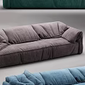 Modern Three Seater Sofa With Blue And Teal Plush Cushions Soft Upholstery