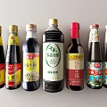 Various Kitchen Condiment Bottles With Different Labels And Colorful Design 3d model