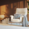 Stylish Leisure Chair With Striped Pillow Gray Throw Blanket Wooden Wall Green Plant Table Lamp