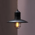 Industrial Black Metal Pendant Light With Conical Shade And Caged Illuminated Bulb On Gray Wall