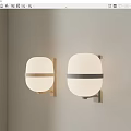 Modern Wall Lamps With White Shades And Metal Frames On Beige Wall