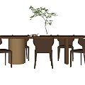 Modern Round Dining Table And Chairs Set With Metal Base Brown Leather And Green Plant