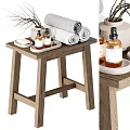 Bathroom Daily Wash Essentials On Wooden Stool With Towels Soap Bottles