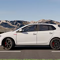 White Volkswagen Golf GTI 5 Door Hatchback With Sporty Design On Mountain Road