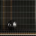 Glossy Black Sphere Placed On Grid Floor With Grid Wall Background 3d model