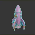Pink Toy Rocket Model With Red Eyes And Blue Accents On Black Background