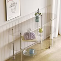 Modern Entryway Console Table with Glass Shelves and Decorative Vase on White Wall