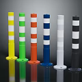 Colorful Bollards With White Stripes And Round Base On Dark Background
