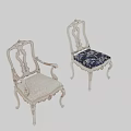 Ornate Leisure Chairs with Silver Carved Frame Light Fabric And Dark Blue Patterned Cushions