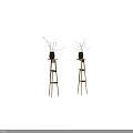 Red Ceramic Vases With Slender Branch Flowers Placed On Wooden Stands In Minimalist Light Background