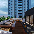 Outdoor Terrace Restaurant With Tables Chairs Green Plants Umbrella Water Feature And Night View