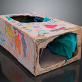 Handmade Cardboard Furniture With Kids' Drawings Holes And Cozy Fabric Inside