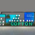 Event Display Wall With Blue Background Showcasing White Items And Green Plants For COPTON