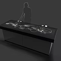 Silhouette of woman operating black kitchen countertop with induction cooktop and control knobs
