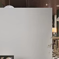 Elegant Modern Restaurant Interior With Chandeliers Decorative Paintings And Dark Green Walls
