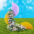 Vibrant Floral Installation With Pink White Flowers Purple Yellow Semi Circular Decorations On Green Grass