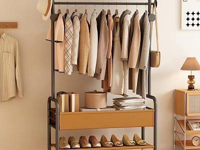 Modern Metal Frame Clothes Rack with Hanging Neutral Tone Clothes and Shoe Storage Drawer 3d model