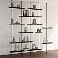 Decorative Ornaments Set on Black Multi Layered Shelf with Vases Sculptures Photo Frames and Books