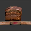 Fresh Sliced Bread on Wooden Cutting Board Against Black Background