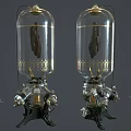 Pair of Vintage Glass Dome Decorative Pieces With Intricate Metal Base Design