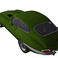 Green Vintage Sports Car With Sleek Retro Design And Classic Wheels