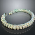 Vintage Bronze Colored Circular Bracelet Featuring Raised Decorative Patterns For Daily Use
