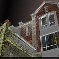 Detached Villa With Red Brick Exterior Climbing Vines Windows And Sunset Sky View