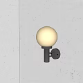 Minimalist Modern Wall Lamp on Gray Concrete Wall with White Spherical Lampshade and Black Pole