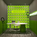 Public Office Space With Green Grid Pattern Wall Manifest Lettering White Round Table And Laptop