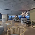 Modern Lounge Area Interior With Rattan Chairs Grey Sofa And City View Windows