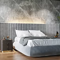 Double Bed With Striped Headboard Gray Bedding Gray Marble Wall Wooden Floor And Green Plant