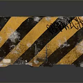 Worn Road Barrier Block With Yellow Black Diagonal Stripes And Graffiti