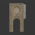 Traditional Stone Architectural Structure With Arched Doorway And Circular Carved Decoration