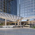 Modern Architectural Canopy At Building Entrance With Metal Frame And Glass Roof