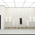 Modern Clothing Store With Glass Facade Logo Sign Display Racks And Outdoor Trees